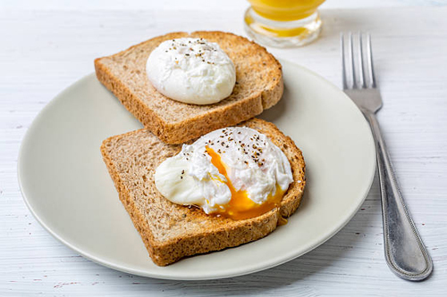  Poached Egg with Brown Bread & Orange Slices 